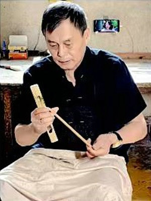 解甲歸田筆為媒 非遺傳承后來人——呂衛(wèi)國